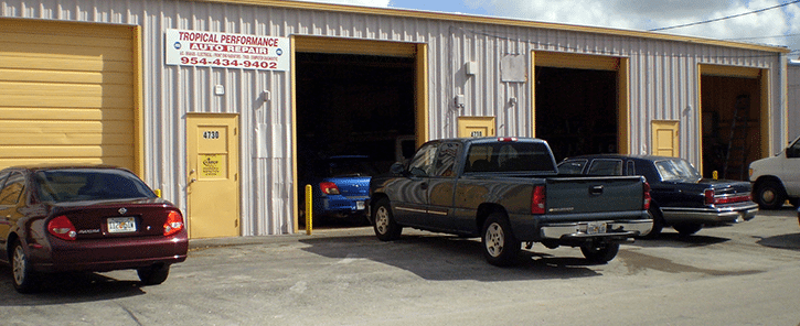 Cars at a High-Performance Auto Body Shop