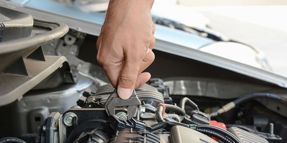 Man repairing engine